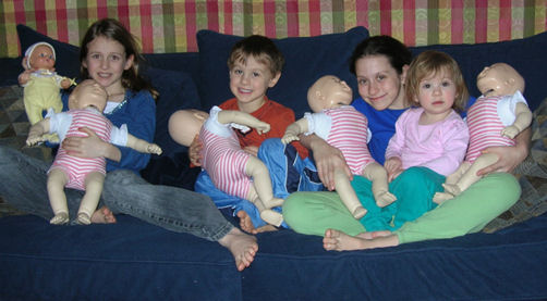 An older picture of Gail's children and her original infant mannequins
